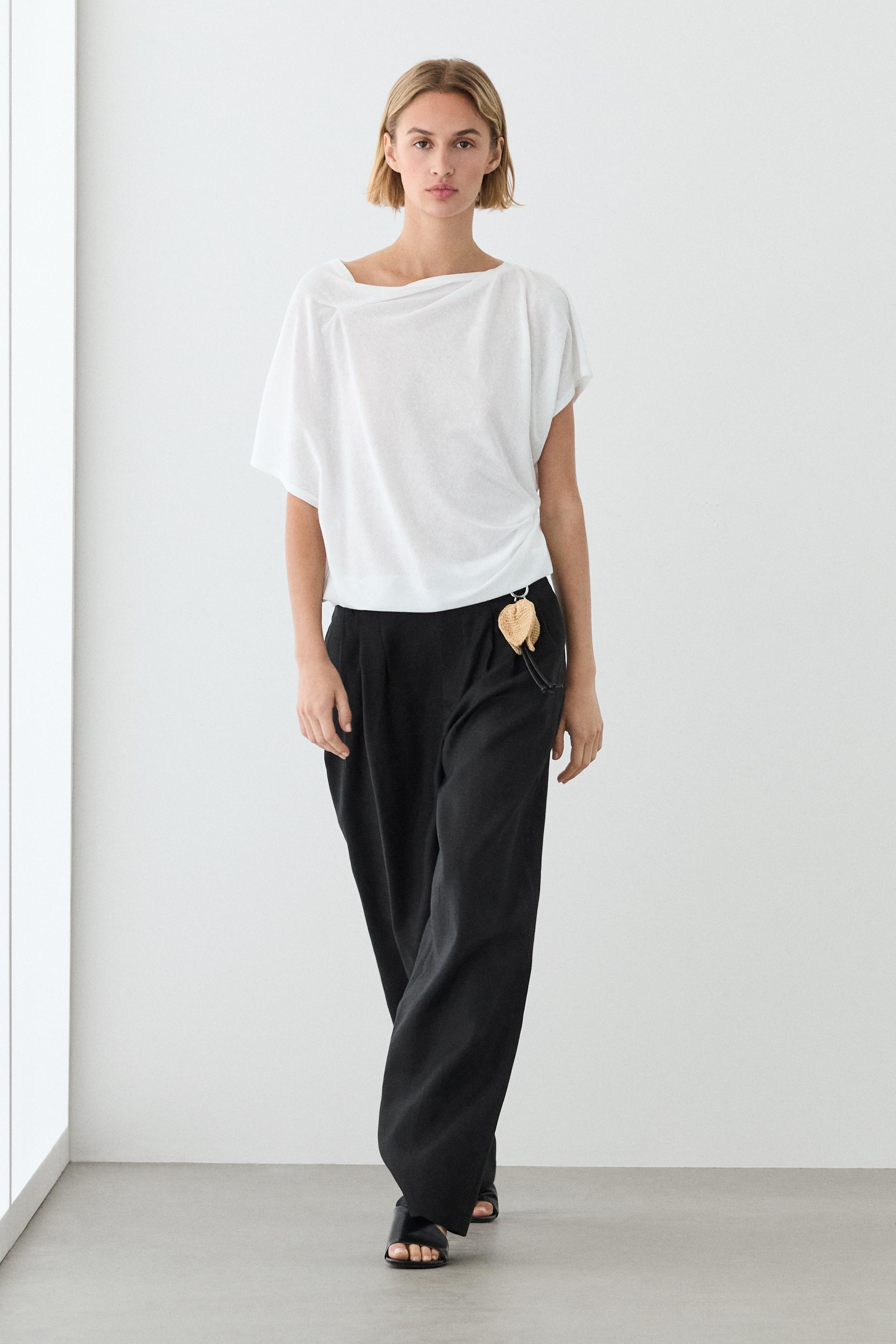 Wide-leg pleated linen trousers
